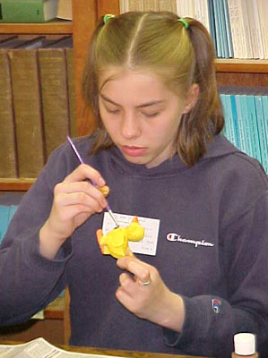 Painting a clay duck